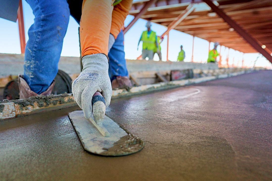 Concrete work team performing a core demolition task